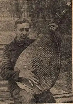 A man playing a bandura