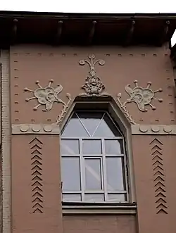 Decorative elements on the building of Kyiv Commercial School