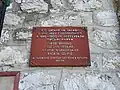Memorial plaque on the wall of the Saints Peter and Paul church in Tsyhany