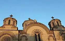 Top of the facade and detail of the domes of the Church of the Holy Trinity in Leskovac