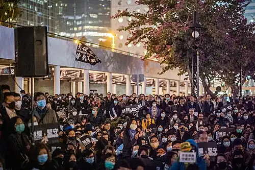 Protesters holding banners
