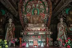 Statues of Sakyamuni, Ananda and Kassapa Buddha at the hall.