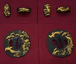 Fuchigashira (top) and tsuba (bottom) made by Ishiguro Masayoshi. Late Edo period. Designated as Special Important Fitting by NBTHK.