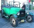 A 1927 Ford T with wood artillery wheels}