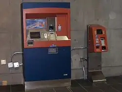 Typical vending machine (left) and recharging station (right) inside the Cartier Metro station.