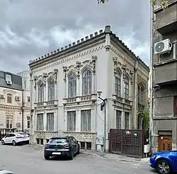 Local/Wallachian Gothic Revival - House of Guilds (Strada Stelea Spӑtarul no. 10), Bucharest, 1859–1862, by Luigi Lipizer[35]