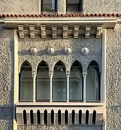 Window design on George Enescu street no. 14, an example of Mediterranean Revival architecture