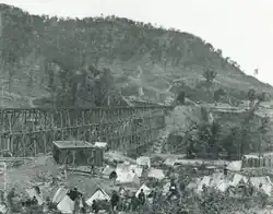 1 1864 US Military Railroads bridge across Running Water creek near Whiteside, Tenn. Four-tiered, 780-foot-long railroad trestle bridge built by the 1st Michigan Engineers with guard camp also shown.