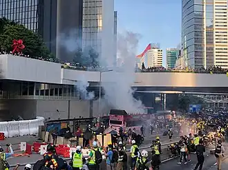 Police firing tear gas to disperse protesters near Central Government Complex