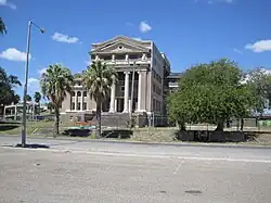 Oblique view of the front of a courthouse