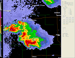 A radar image sequence of the tornado at EF5&nbsp;intensity, marked as a purple and later red triangle, tracking towards Greensburg before lifting. A distinct hook echo is visible.