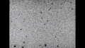 20 minute timelapse, taken two days before closest approach. The asteroid can be seen near the center of the image, moving towards the lower left. Brightness is inverted (stars appear dark, the sky background appears light).[5]