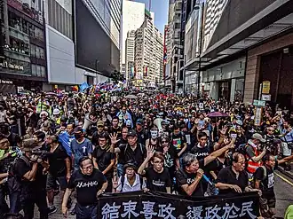 Protesters marching in Causeway Bay