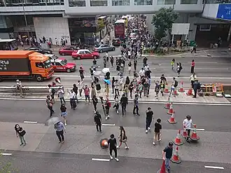 Protesters setting up roadblocks in Connaught Road, Central.