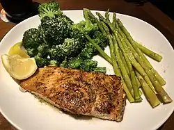 Herb-grilled salmon with side of asparagus and broccoli