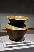 Proto-porcelain zun with bluish brown glaze. Shang period. Henan Museum