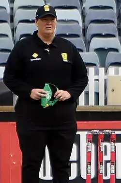 Redfern umpiring during WBBL