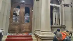 Smashed windows of the building of the City Assembly of Belgrade with gendarmery inside the building on 24 December 2023