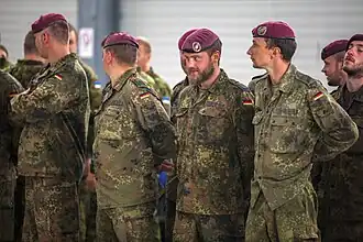 German soldiers wearing Flecktarn shirts and trousers.