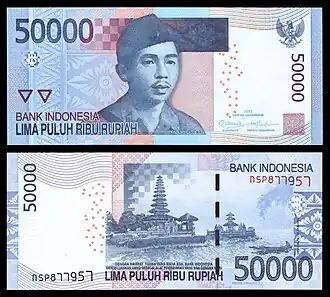 Image 8 Indonesian rupiah Banknotes: Bank of Indonesia The rupiah is the national currency of Indonesia. Introduced in 1946 by Indonesian nationalists fighting for independence, the currency replaced a version of the Netherlands Indies gulden which had been introduced during the Japanese occupation in World War II. In its early years the rupiah was used in conjunction with other currencies, including a new version of the gulden introduced by the Dutch. Since 1950, it has had a lengthy history of inflation and revaluation. As of August 2018[update] '"`UNIQ--nowiki-00000020-QINU`"' , the currency—which is issued and controlled by the Bank of Indonesia—is trading for more than 14,600 rupiah to the United States dollar. This note, denominated 50,000 rupiah, is from a 2011 revision of an earlier series. It depicts I&nbsp;Gusti Ngurah Rai, a National Hero of Indonesia, on its obverse, and Bratan Temple on its reverse. See other denominations: Rp&nbsp;1,000, Rp&nbsp;2,000, Rp&nbsp;5,000, Rp&nbsp;10,000, Rp&nbsp;20,000, Rp&nbsp;100,000 More selected pictures
