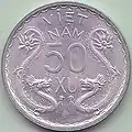 A 50 xu coin issued by the State of Vietnam (1953).