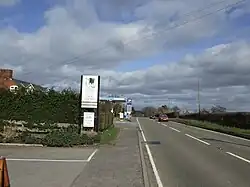 A picture of a road and petrol station at Wormbridge