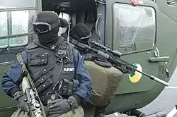 Irish Army Ranger Wing airborne sniper team on a helicopter during the 30th anniversary of the ARW.