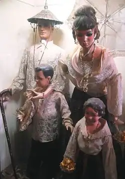 Depiction of 19th Century family belonging in the Principalía class.