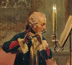Portrait of man playing the flute