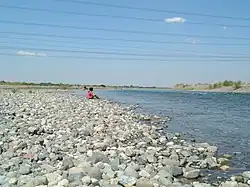Part of Agno River flowing near Barangay San Vicente, Santa Maria Pangasinan. A faint image of Narciso Ramos Bridge can be seen at a distance.