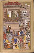 Hussain Quli presents prisoners of war to Akbar, a view of the bin player Naubat Khan (in white dress holding Rudra Vina).[1] Illustration from the Akbar-nama, Mughal school, towards 1590.Victoria & Albert Museum U.K.