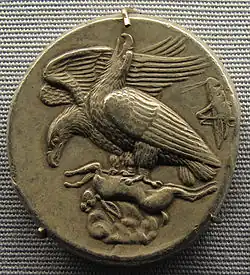Ancient Greek tetradrachm coin, 410 BC, with grasshopper at right