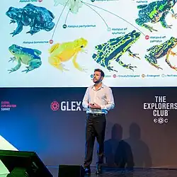 Biologist Alejandro Arteaga giving a presentation about harlequin toads
