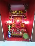 A small altar in a private house, Pattaya, Thailand.