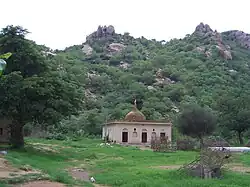 Ancient Shiva Temple on the levelled surface of the crater inside the hill.