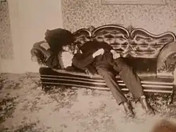 Man lying on a sofa