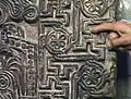 Khachkar with hexafoils, swastikas and sauwastikas in Sanahin, Armenia