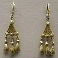 Pair of matching earrings with triple pendants