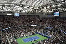 Image 42Arthur Ashe Stadium with the roof closed in 2018. (from US Open (tennis))