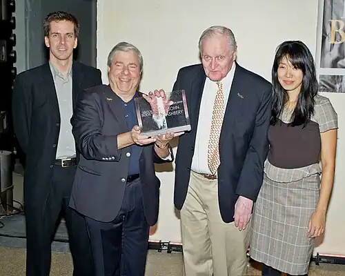 Ashbery accepts the "BoBi" Award. From left to right: Johnny Temple, Marty Markowitz, Ashbery, and Tina Chang.