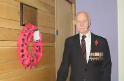 Austin Ardill dedicating a war memorial plaque in 2007