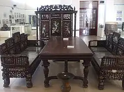 Mother of pearls inlaid furniture set in An Giang Museum, Vietnam.