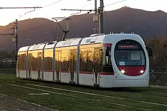 The light rail transit trams on the Xijiao (Western Suburban) line run on standard gauge track and draw power 750V alternating current (AC) electrical power from overhead lines. The Xijiao line uses five-car trams and can reach a top speed of 70 km/h (43 mph).