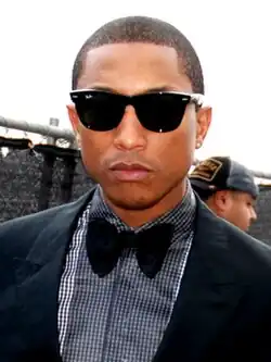 A picture of Pharrell Williams towards the camera