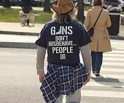 Reverse side of a shirt with a slogan