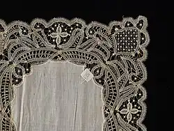Lace doily by needleworker Barbett A. Hook with a pineapple pattern in the corner, 1894–1906
