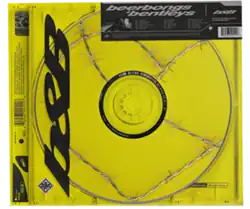A disc wrapped in barbed wire inside a jewel case