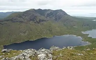 Full ridge of Ben Lugmore, viewed from across Doo Lough, on Barrclashcame