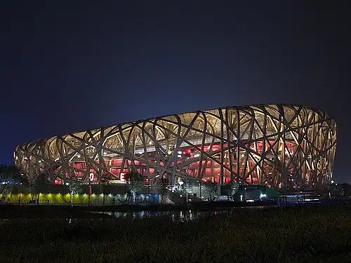 The Beijing National Stadium at night during the Summer Olympics
