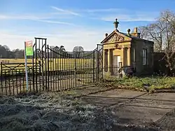 Pair of Lodges flanking N driveway to Leeswood Hall